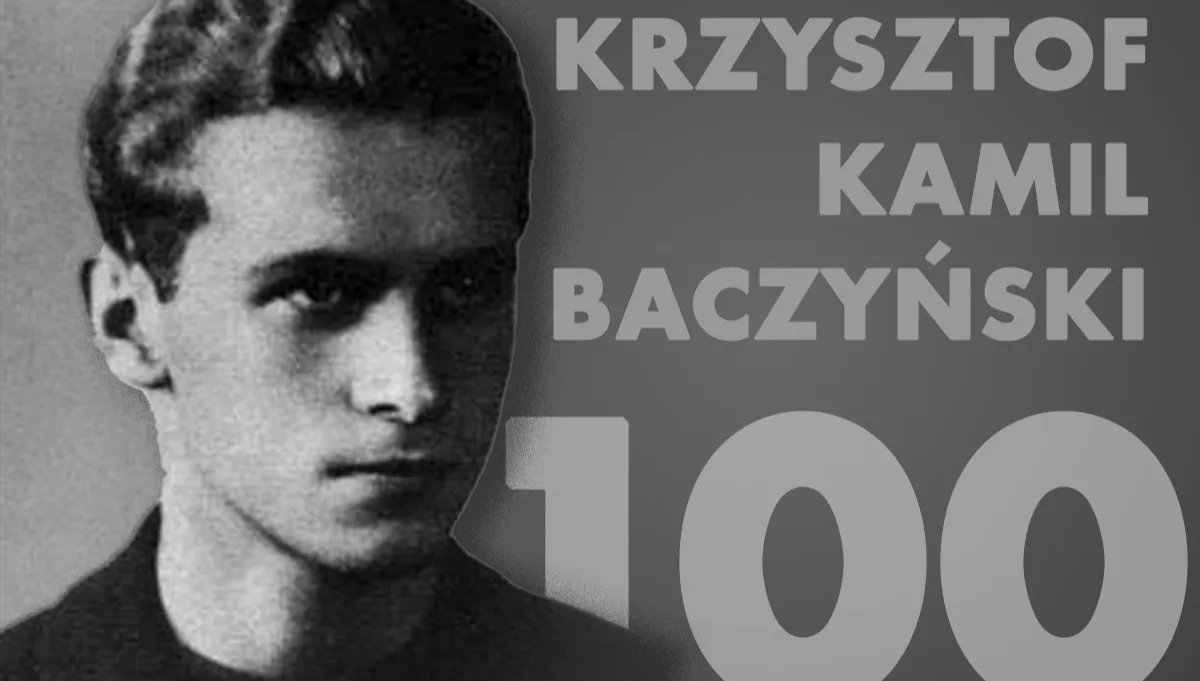 Kwiaty pod tablicą upamiętniającą Baczyńskiego