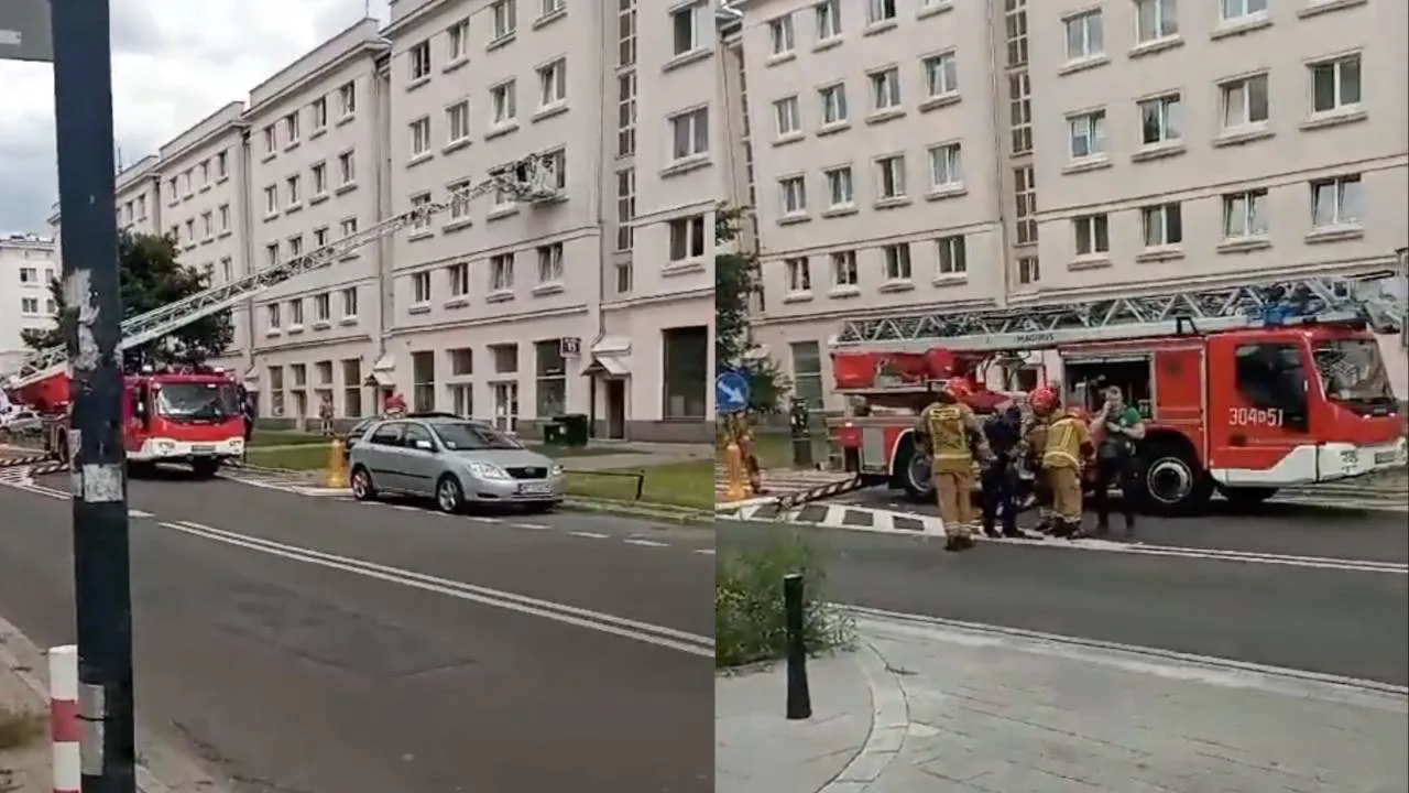Strażacy usiłują dostać się do mieszkania, z którego oddawano strzały.