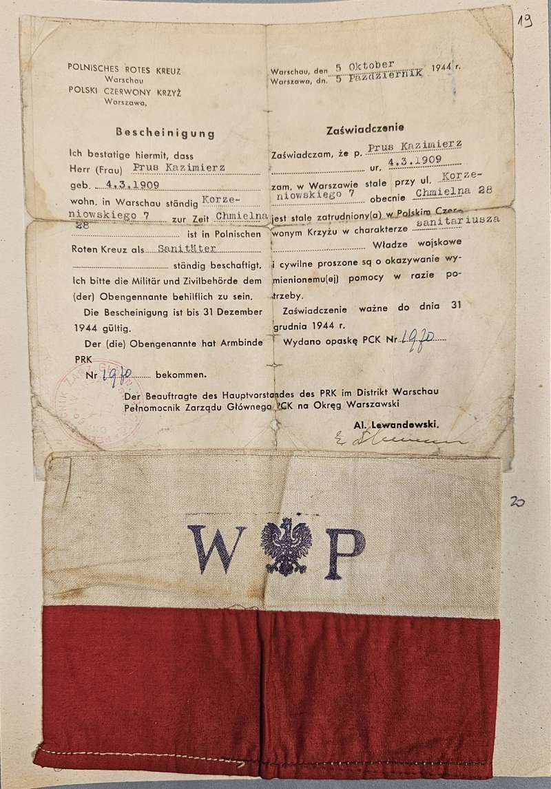 Opaska powstańcza i zaświadczenie sanitariusza Czerwonego Krzyża